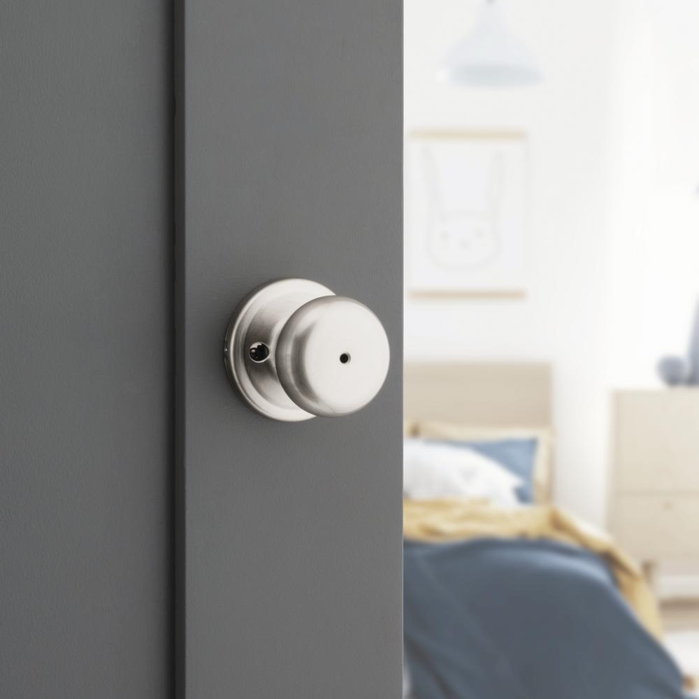 Kwikset Juno Bed & Bath Privacy Door Knob in Satin Nickel